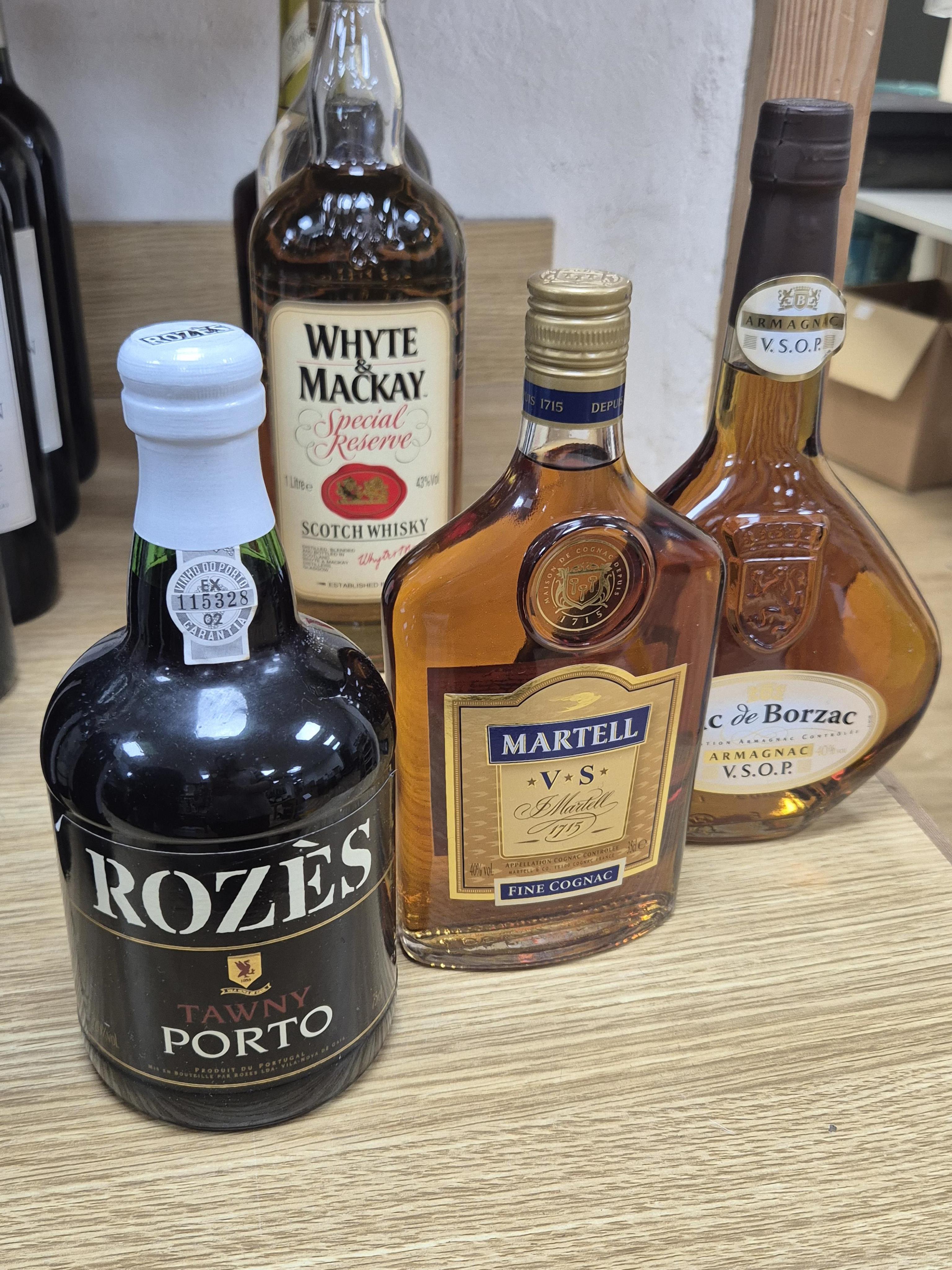 Six bottles of spirits, etc. including; Rozes tawny port, Calvados Boulard, Duc de Borzac Armagnac VSOP, etc.